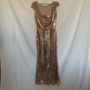 Rose gold sequin evening gown.